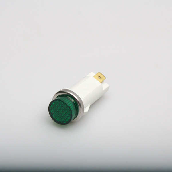 A close-up of a green Vulcan pilot light with a metal ring on a white background.
