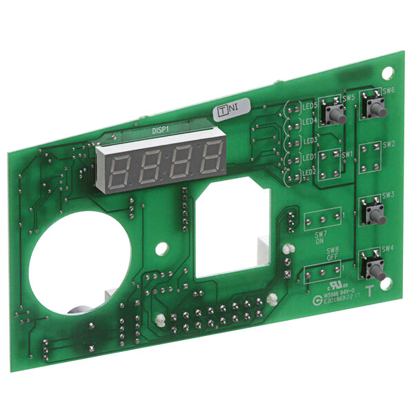 A close-up of a green Hobart printed circuit board with a digital display and buttons.