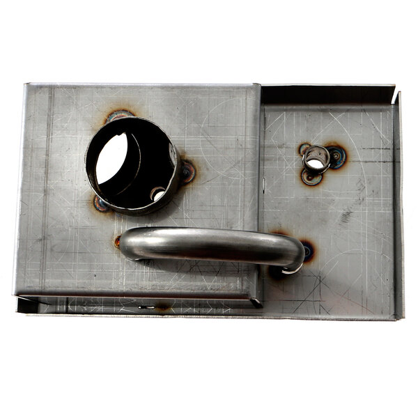 A Groen metal drain box cover with a handle and latch.