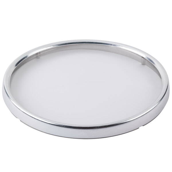 A round silver plate with a white surface.