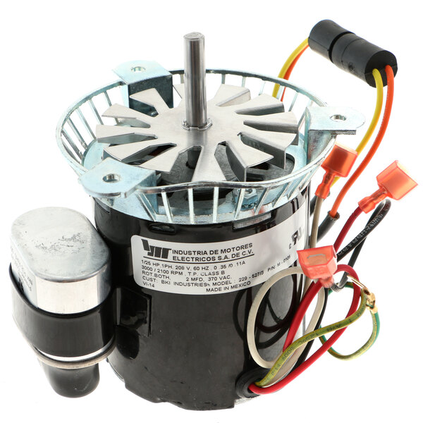A close-up of a BKI M0105 motor with wires attached.