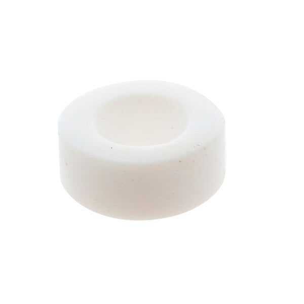 A white round object with a hole.