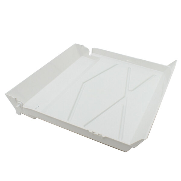 A white Scotsman water curtain tray with a cross on it.