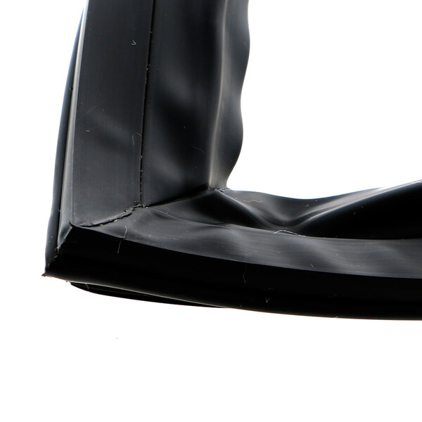 A close up of a corner of a black Master-Bilt Turbo gasket in a plastic bag.