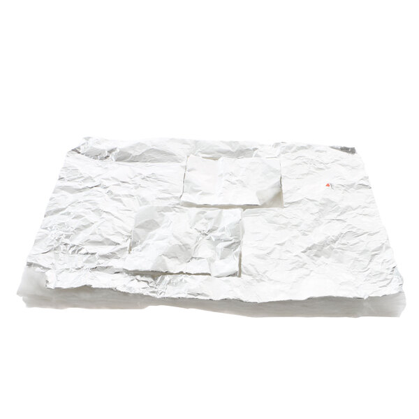 A white sheet of crumpled paper on a surface.