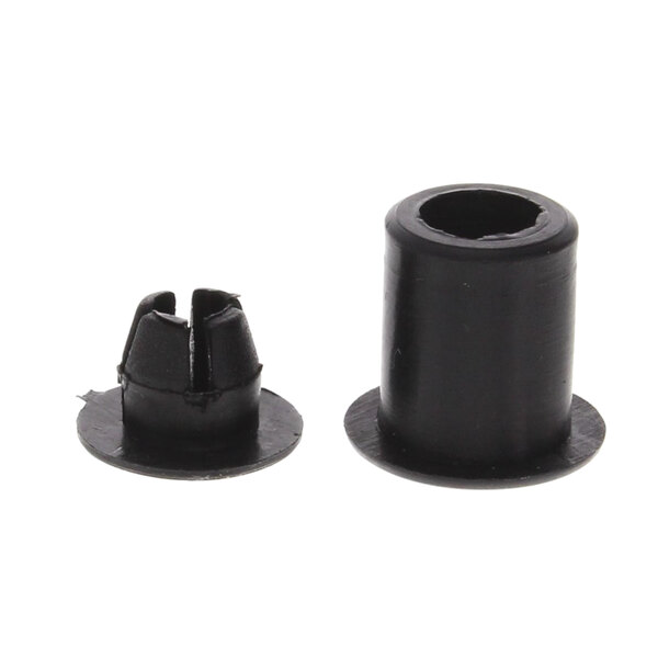 A close-up of a black plastic Cimbali plug with two nuts.