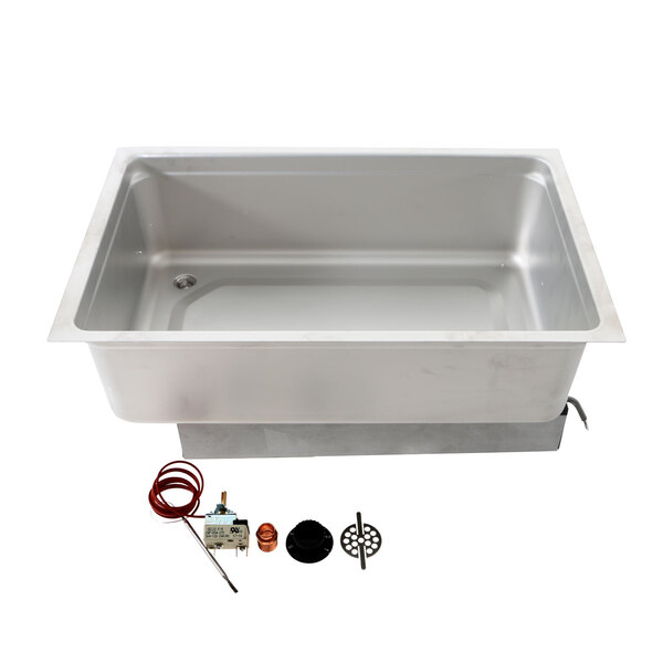 A stainless steel Randell countertop well assembly with parts and wires.