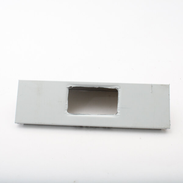 A white rectangular metal splash guard with a hole in it.
