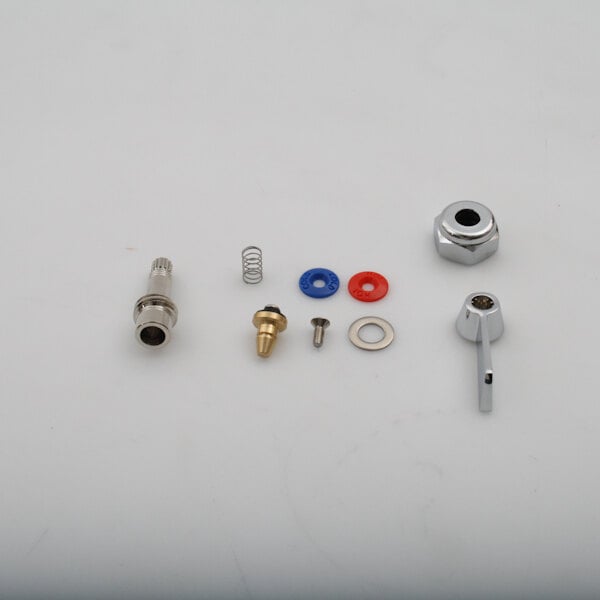 A group of Cleveland steam equipment parts on a white background.
