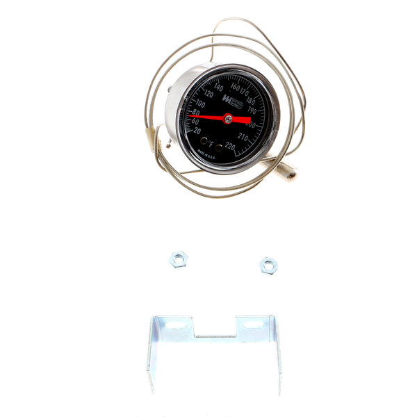 A Metro Tc90 thermometer with a wire attached to it.