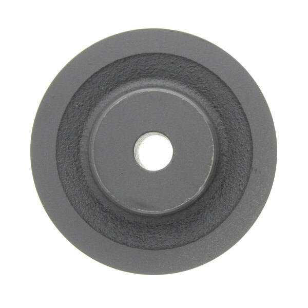 A round black rubber wheel with a hole in the center.