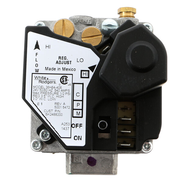 A Cleveland gas valve with a white label and black and white buttons.