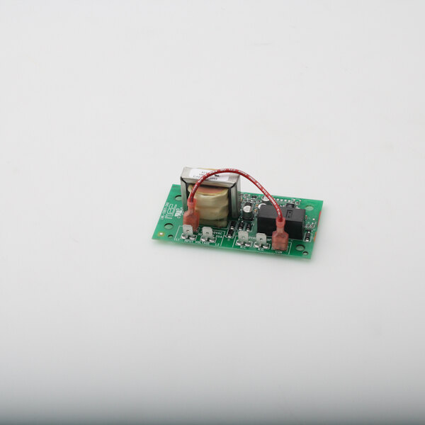 A green circuit board with red wires and a red wire attached.