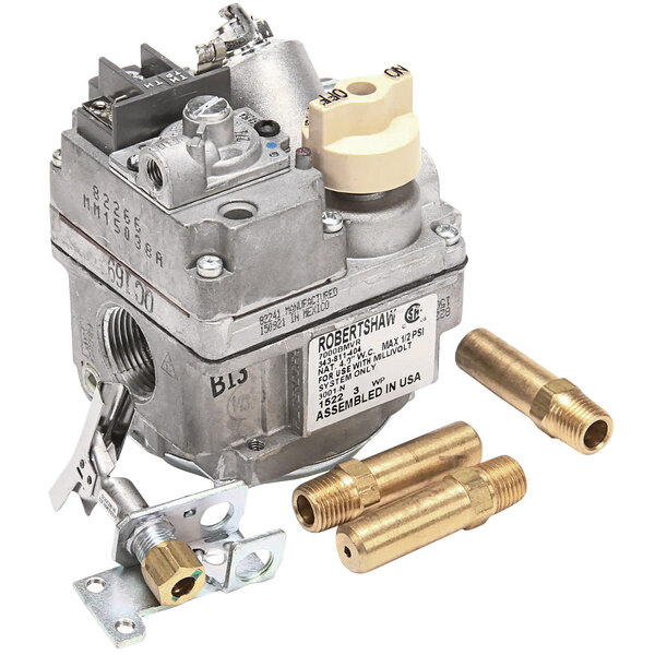 A Tri-Star natural gas conversion kit with a gas valve, brass fittings, and a hose.