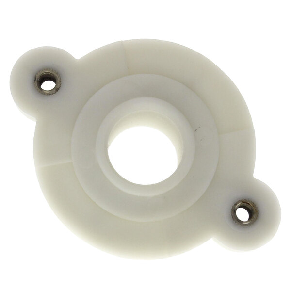 A white plastic circle with holes.