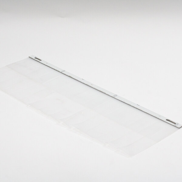 A white plastic sheet with a metal strip on a white surface.