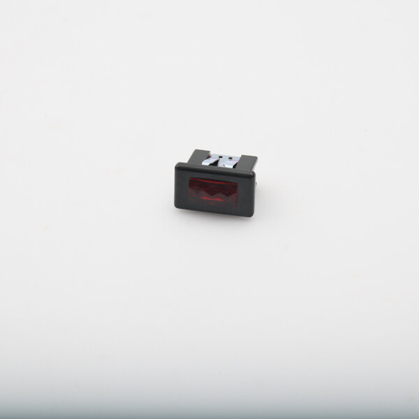 A black object with a small red light.
