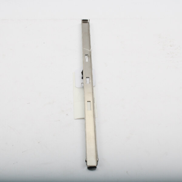 A metal bar with a white label with holes in it.