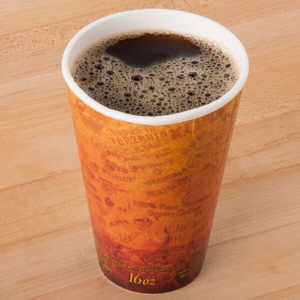 A Dart Fusion Escape foam cup of coffee with foam on a wooden table.