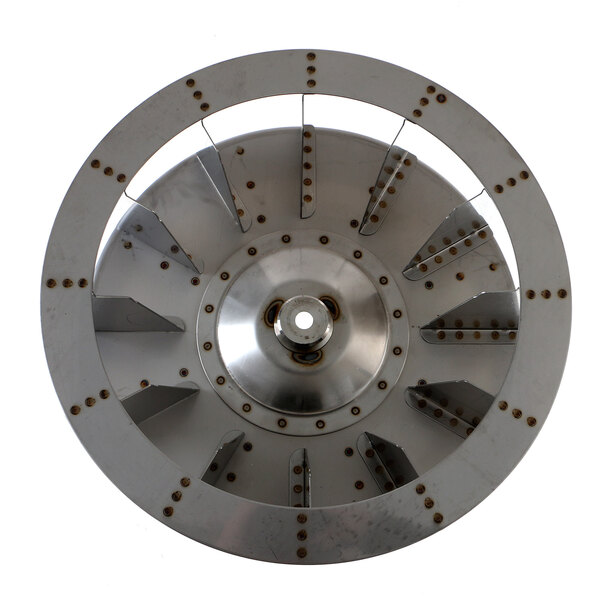 A circular metal Blodgett fan wheel with straight blades and holes in it.