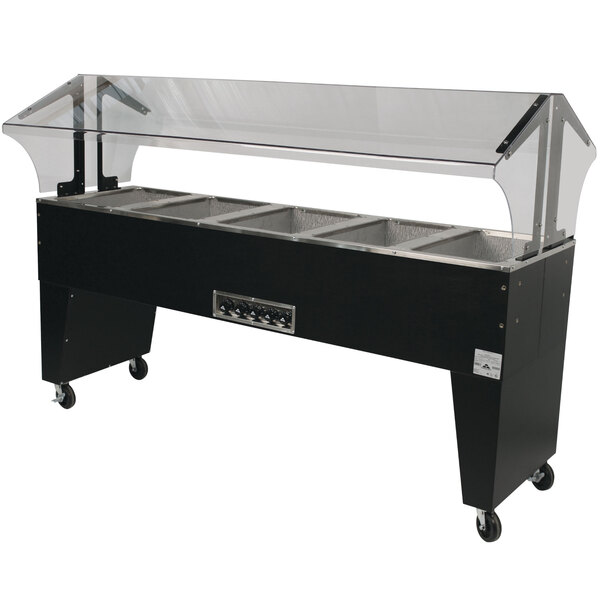 An Advance Tabco stainless steel hot food table with an open well and clear cover on a counter.