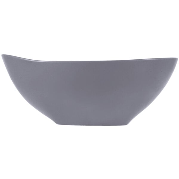 A close-up of a grey Libbey Driftstone bowl with a curved edge.