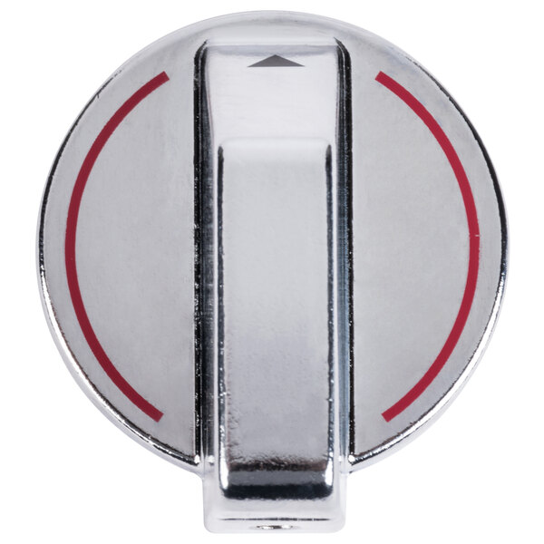 A silver knob with red and white markings on a rectangular background.