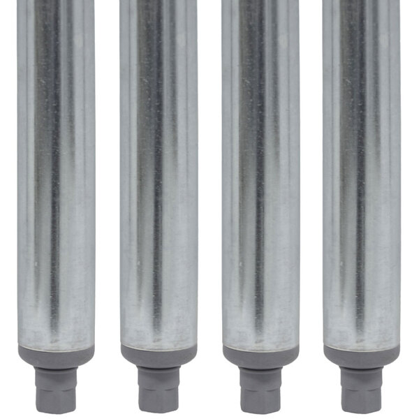 A set of four galvanized steel tubes with one in the middle.