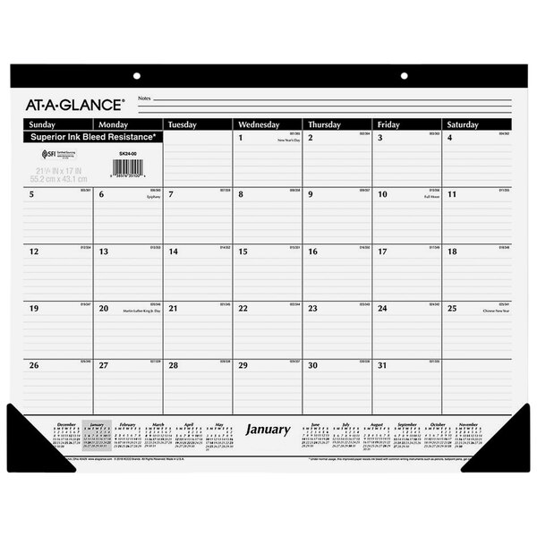 An At-A-Glance desk pad calendar with white background and black numbers for January 2024 - December 2024.