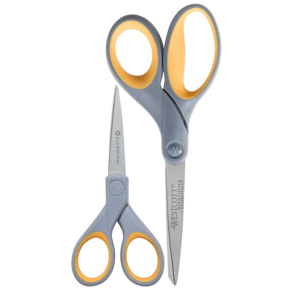 Two Westcott scissors with gray and yellow handles.