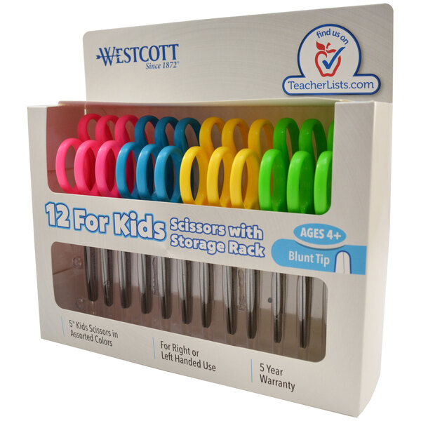 A box of Westcott kids scissors with blue, green, and pink handles.