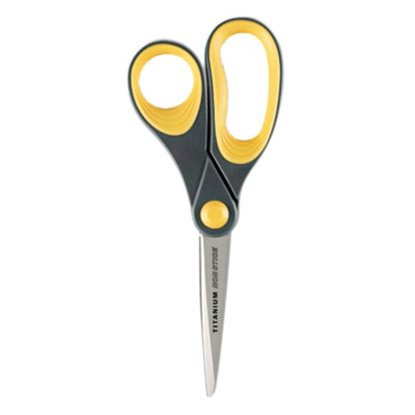 A close-up of a Westcott pair of scissors with gray and yellow handles.