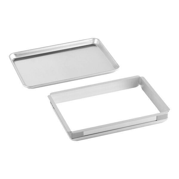A metal half-size sheet cake pan set with an extender frame.