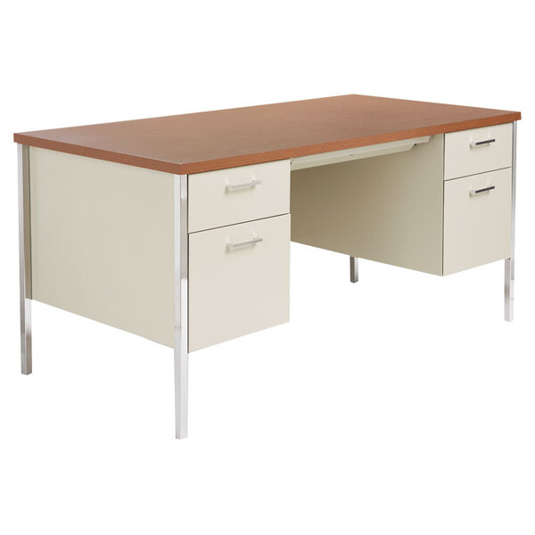 A cherry and putty steel desk with drawers on a white surface.