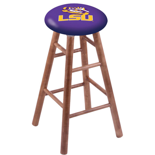 A wooden Holland Bar Stool with a medium finish and an LSU Tigers seat.