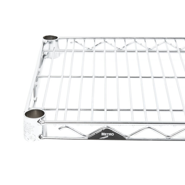 A Metro chrome wire shelf with two holes on each side.