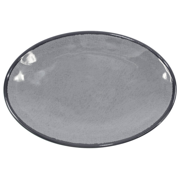 A grey oval plate with a speckled surface and black rim.