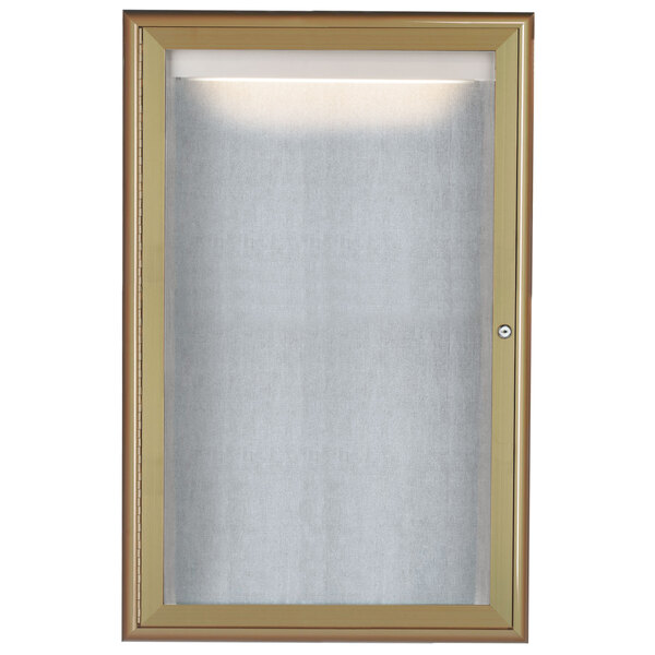 A white glass door with a gold metal frame.