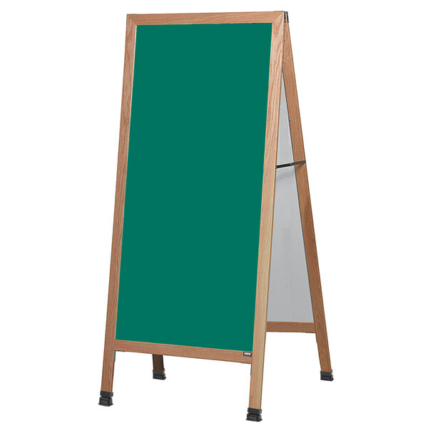 A wooden A-frame sign with a green write-on chalkboard.