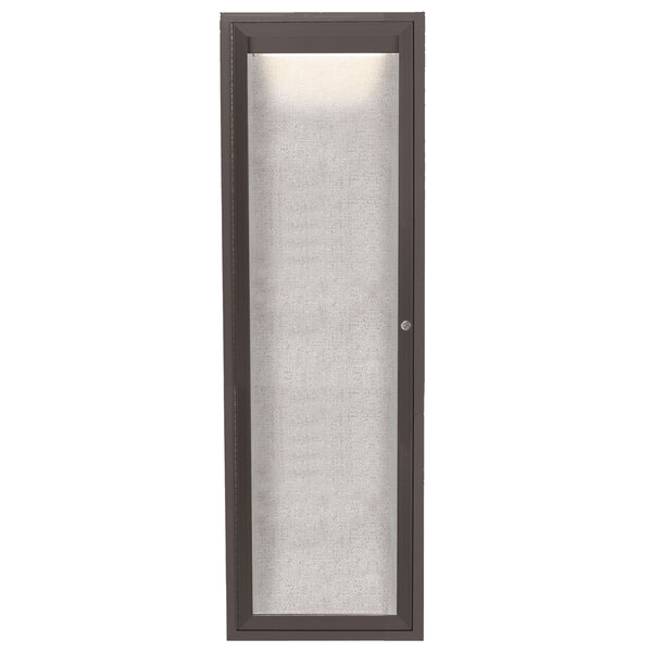 A bronze Aarco bulletin board door with a lighted glass panel.