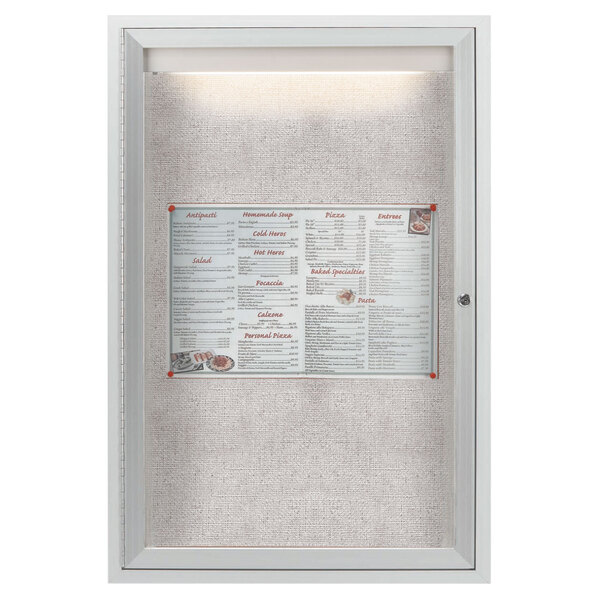 An Aarco enclosed bulletin board with a menu inside.