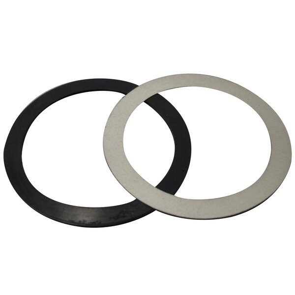 A couple of black and white round rubber gaskets.