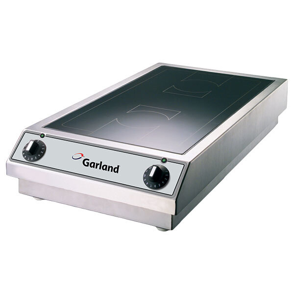 A Garland countertop induction range with a glass top.