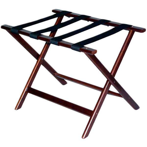 A CSL cherry mahogany wood luggage rack with black straps.