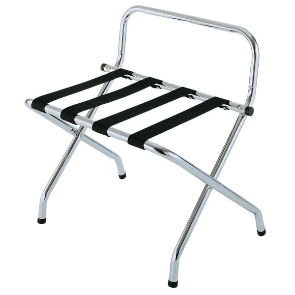 A zinc metal luggage rack with black straps.