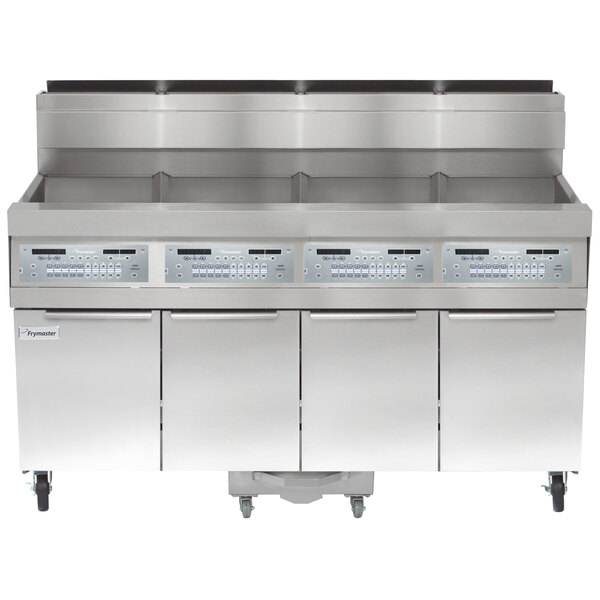 A stainless steel Frymaster commercial floor fryer system with three doors and two drawers.