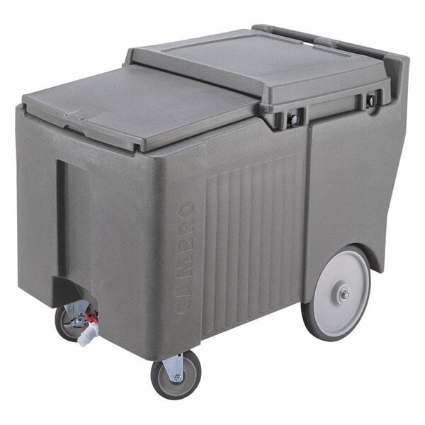 A grey cooler with wheels.
