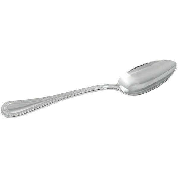 A Bon Chef stainless steel spoon with a silver handle on a white background.