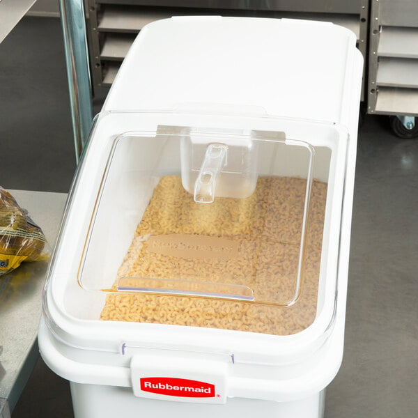 A white Rubbermaid ingredient bin with food inside.