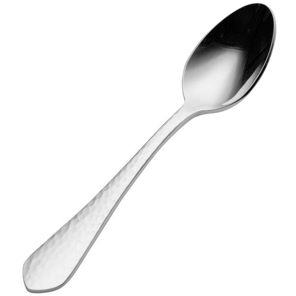 A close-up of a Bon Chef stainless steel demitasse spoon with a silver handle.